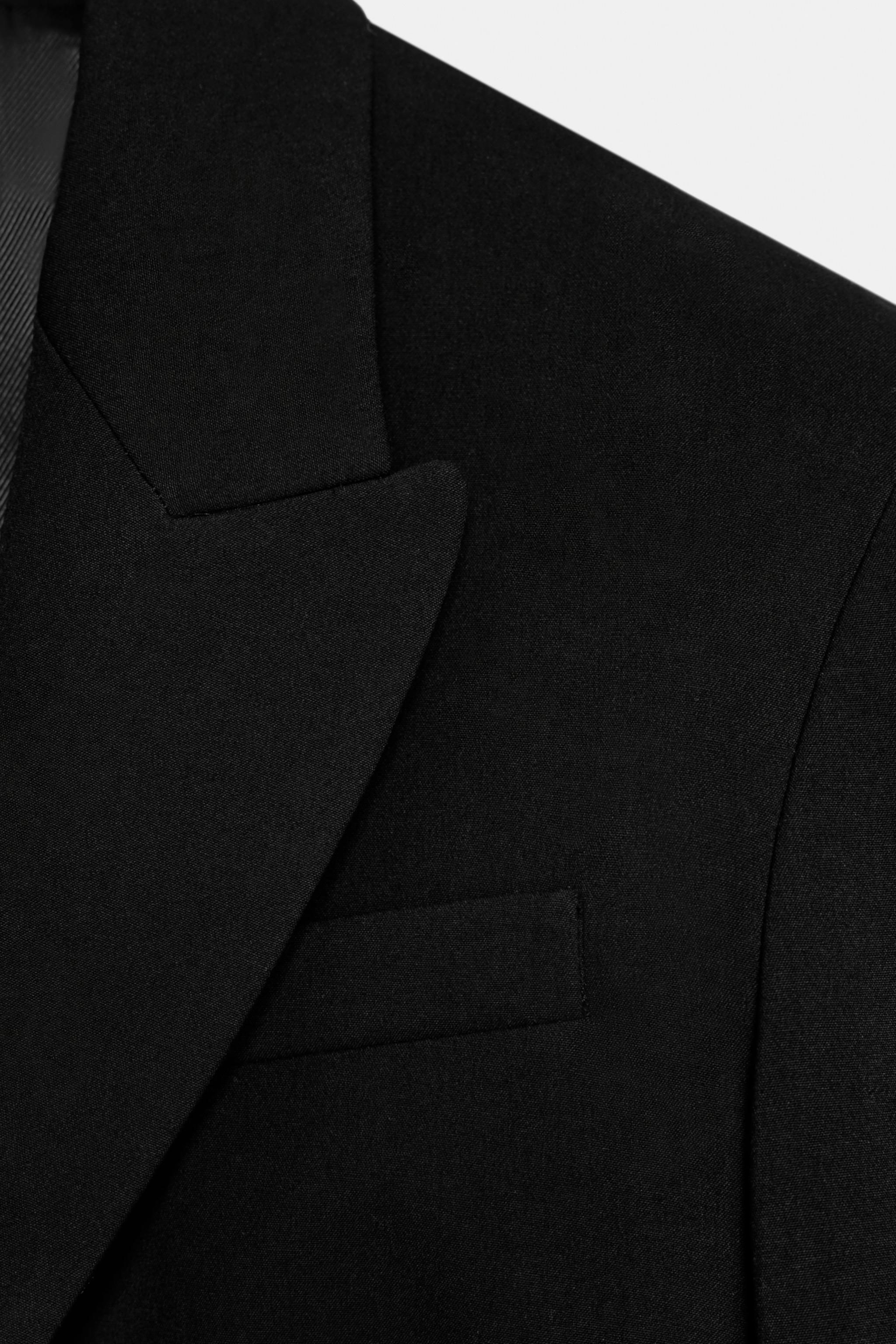 SHORT BLAZER WITH SHOULDER PADS AND PLEATS